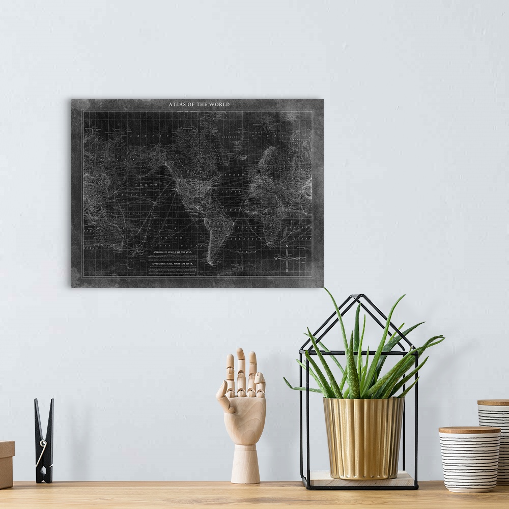 A bohemian room featuring Atlas of the World