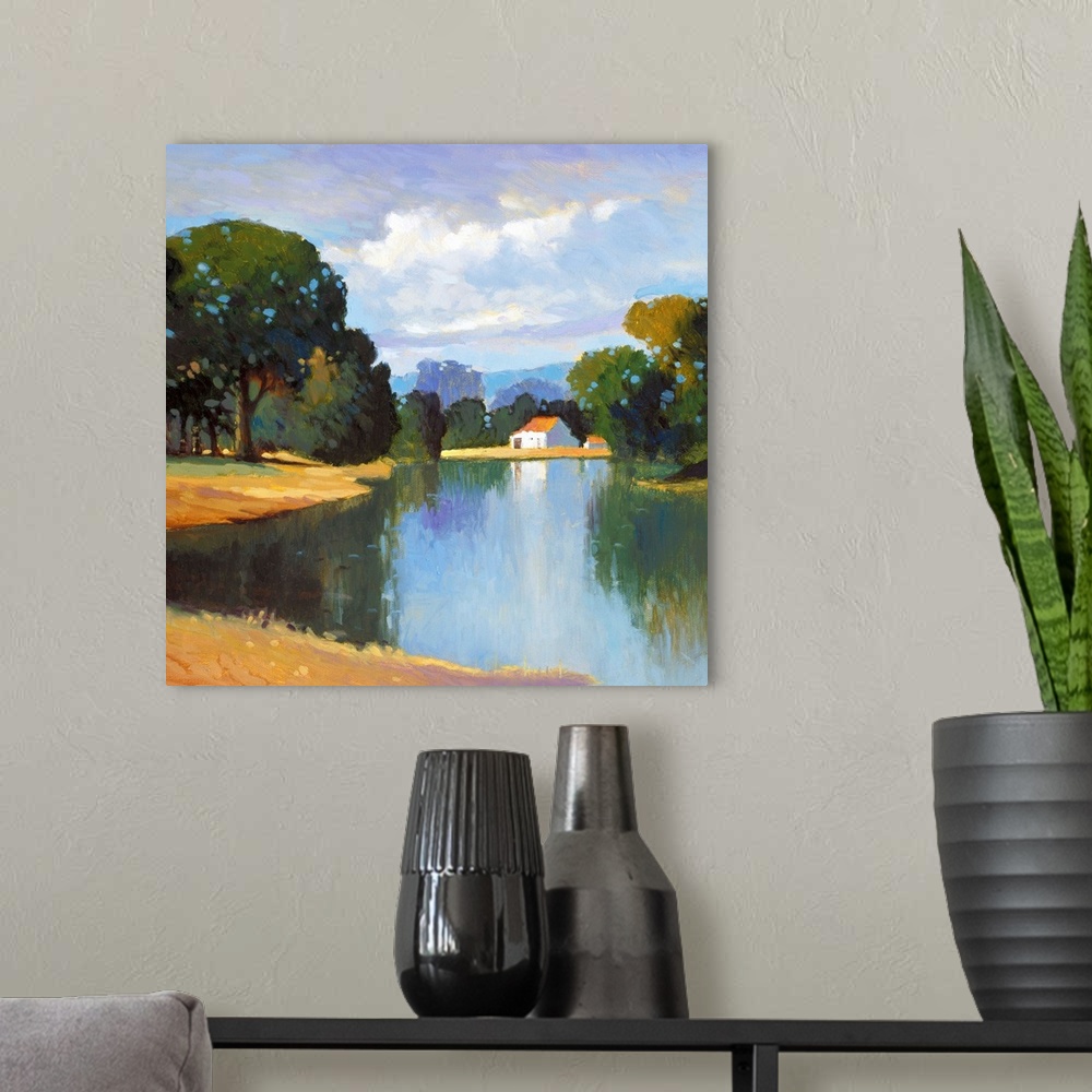 A modern room featuring A contemporary painting of a countryside landscape with a white house in the distance.