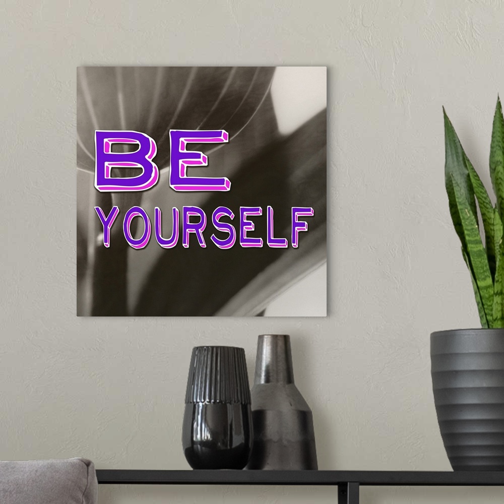 A modern room featuring Be Yourself