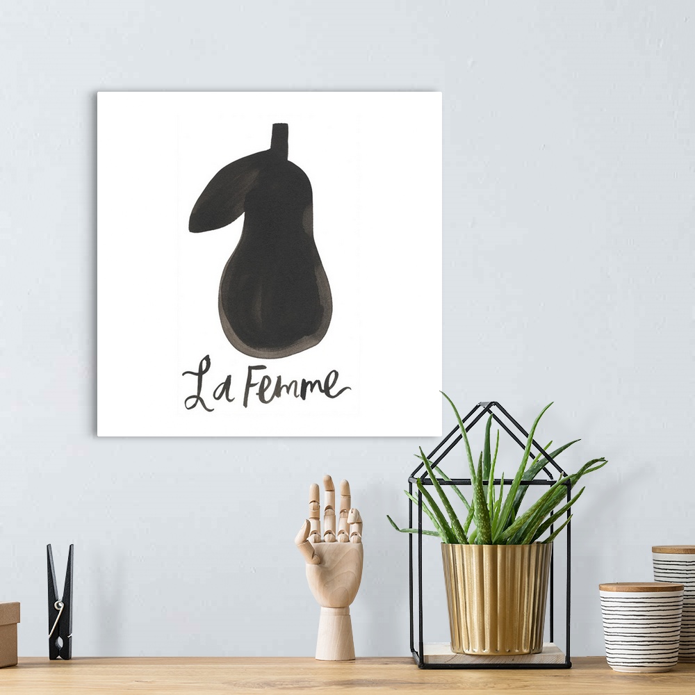 A bohemian room featuring Simple painting of a pear with "la femme" (the lady).