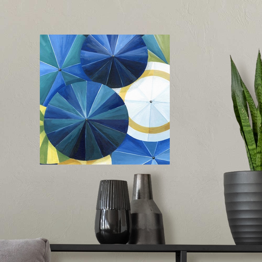 A modern room featuring Contemporary painting of a view of colorful umbrellas seen from above.