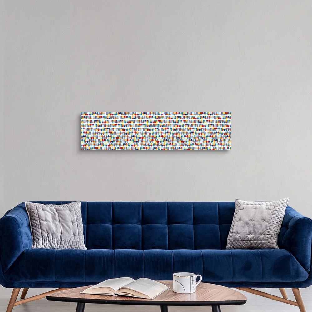 A modern room featuring Large panoramic abstract watercolor painting with geometric patterns in shades of blue, yellow, a...