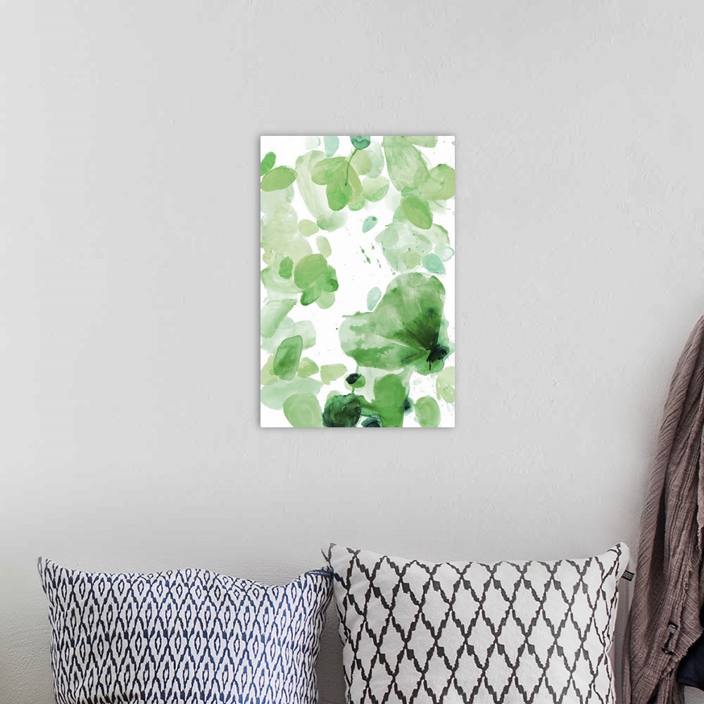 A bohemian room featuring Watercolor painting of in shades of green on white.