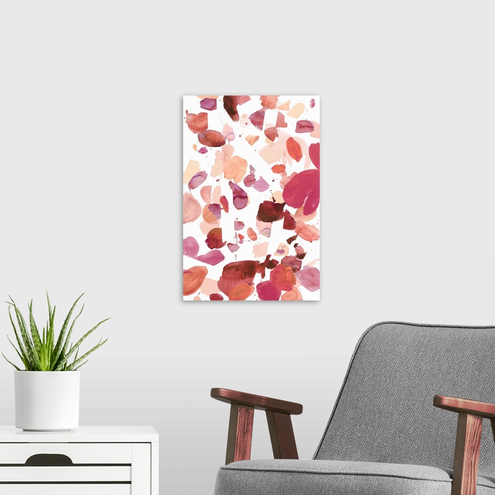 A modern room featuring Watercolor painting of in shades of red on white.