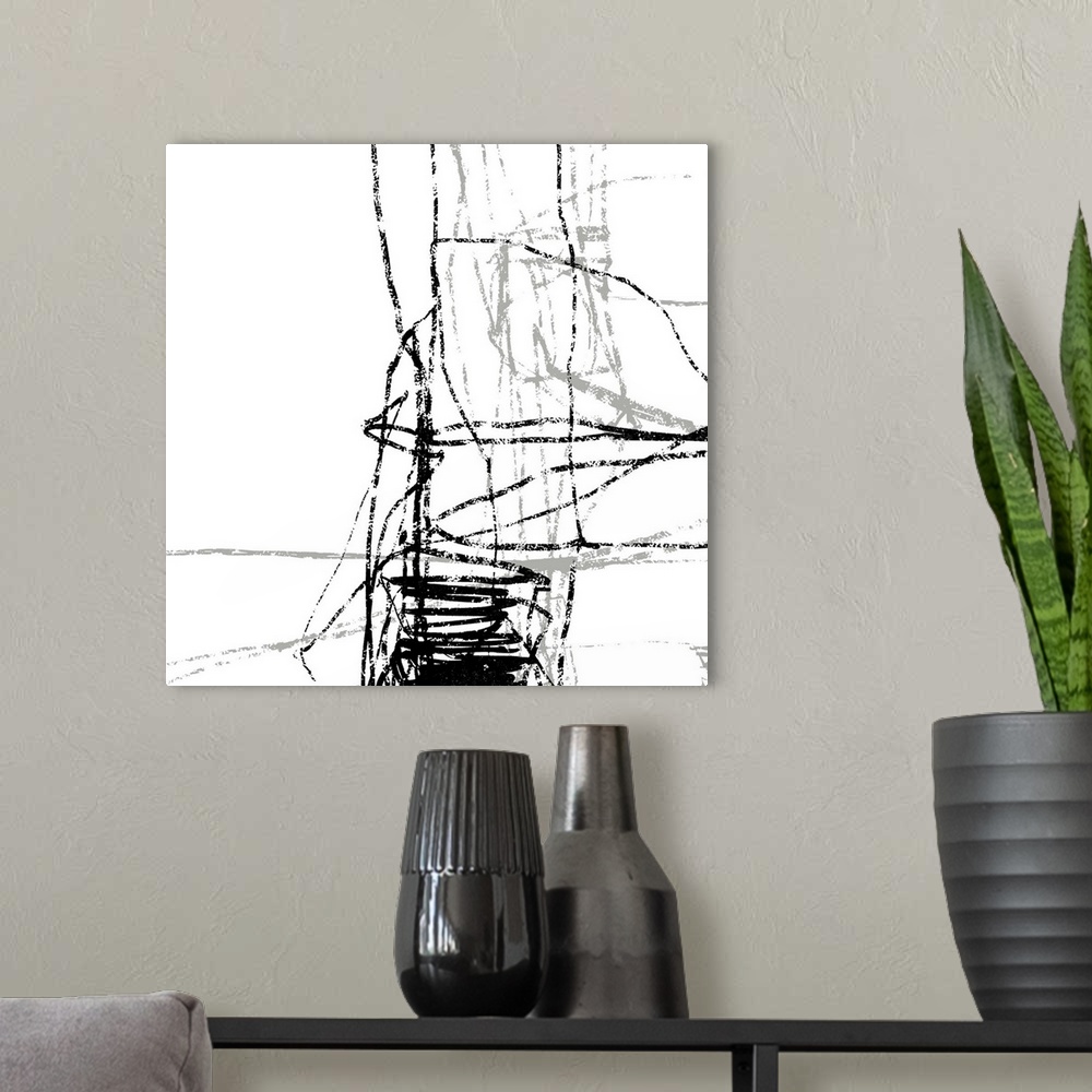 A modern room featuring Contemporary abstract painting of bold black lines against a white background.