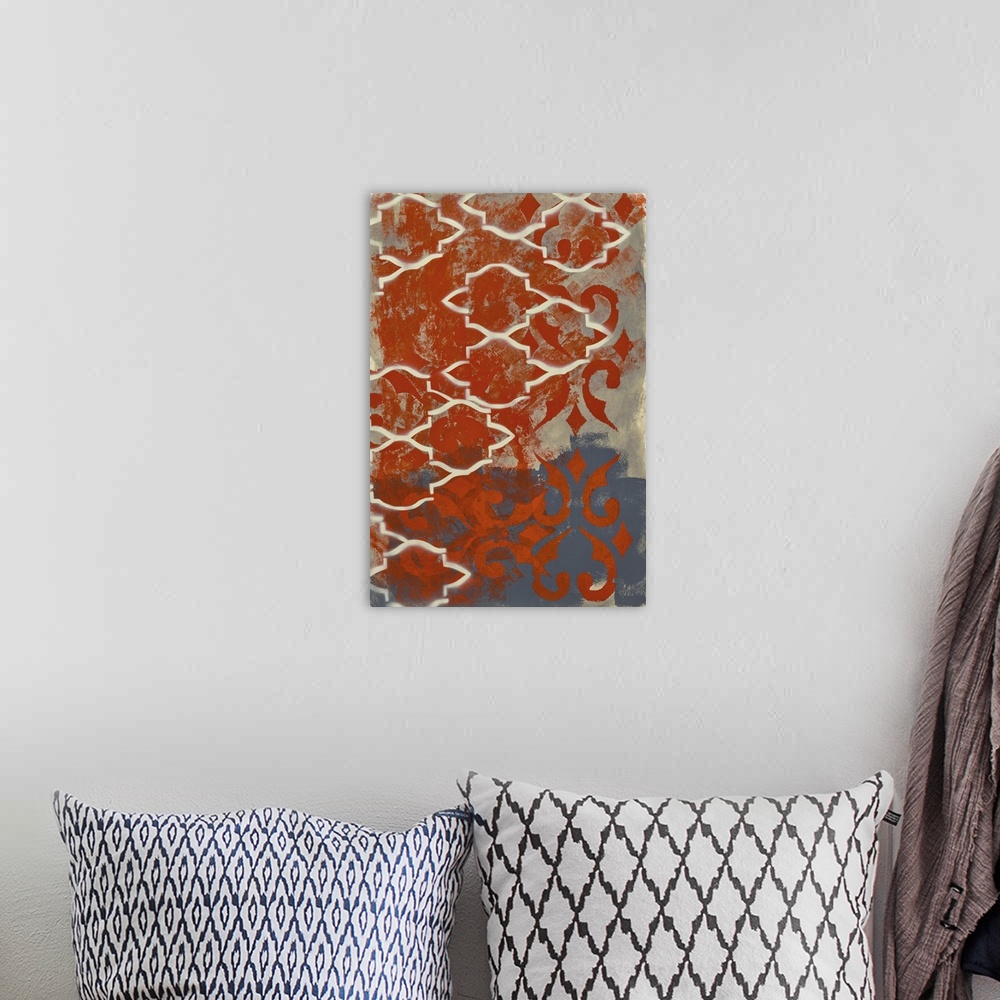 A bohemian room featuring Contemporary abstract painting created with grey and red hues and repeating shapes.