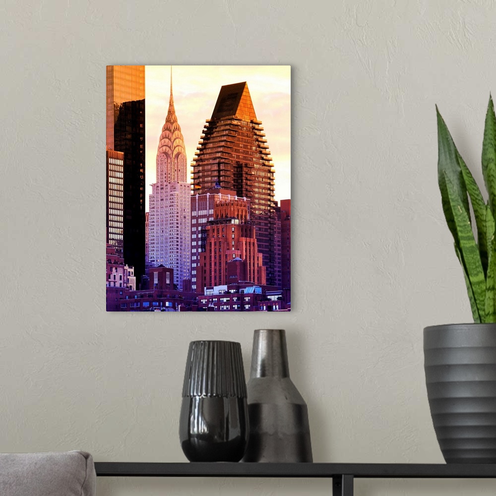 A modern room featuring Vividly colored photograph of the Chrysler building and other skyscrapers in New York City.