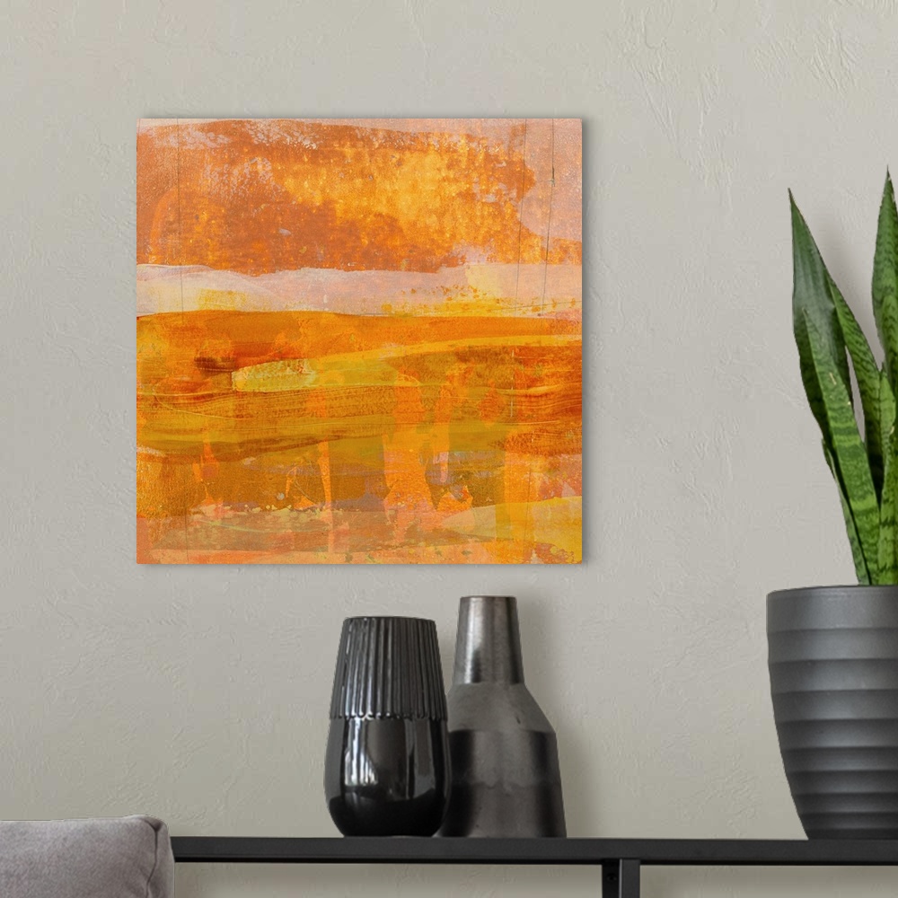 A modern room featuring Square abstract painting with layering  brushstrokes in shades of orange, yellow, white, and grey...