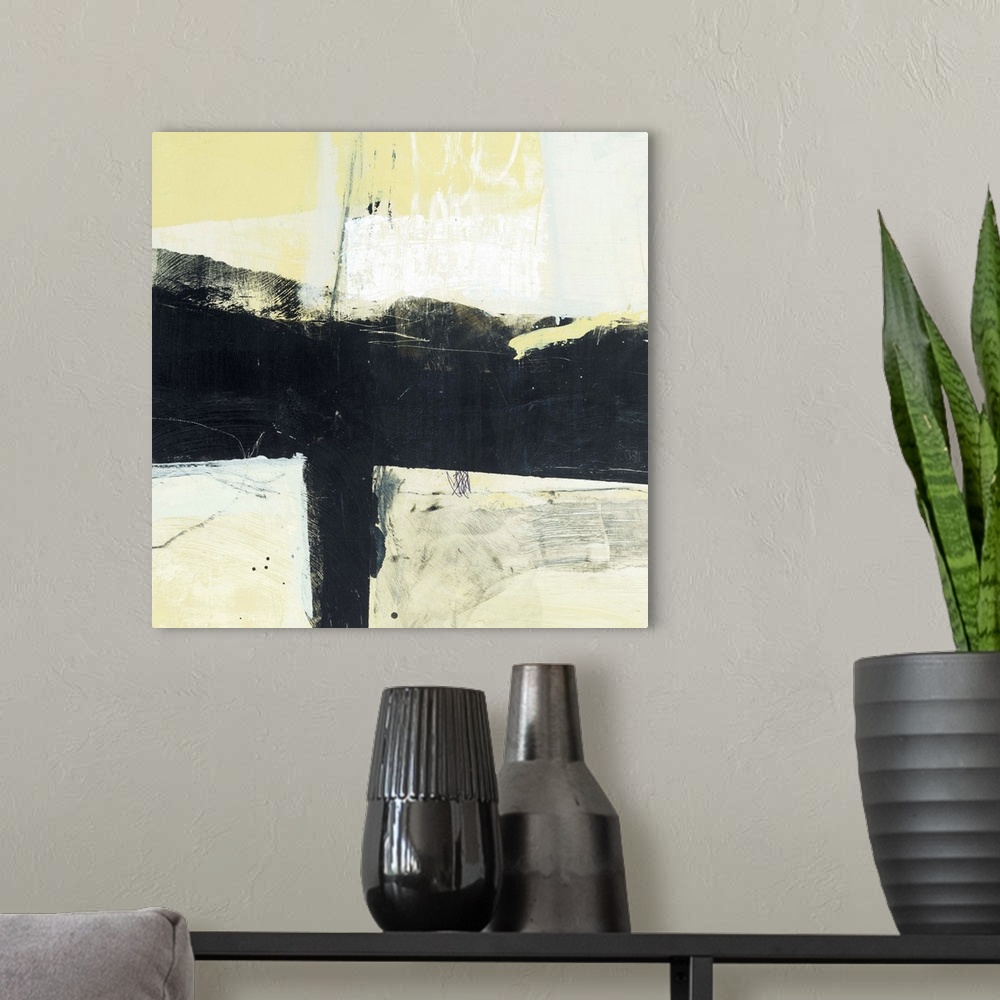 A modern room featuring Contemporary abstract painting using pale yellow with black bold paint strokes.