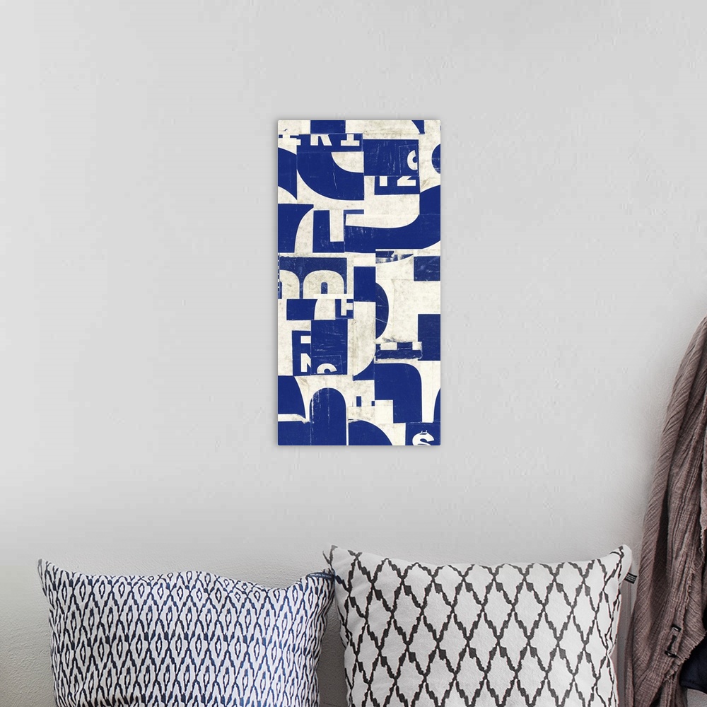 A bohemian room featuring A contemporary painting using geometric shapes and letters in a collage style.