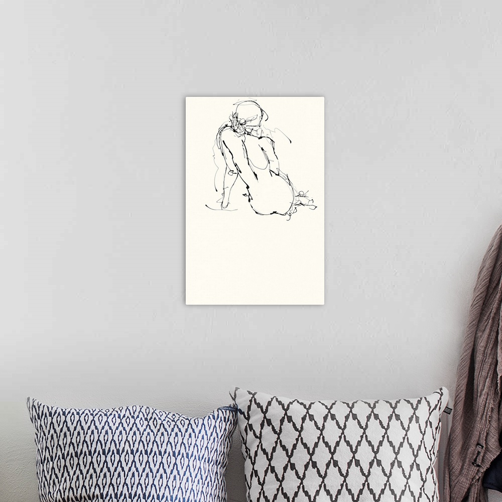 A bohemian room featuring Contemporary nude sketch of the backside of a woman using black ink on an off white background.