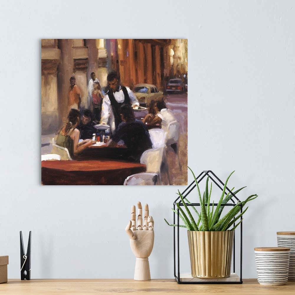 A bohemian room featuring Painting of a couple dining outdoors with a waiter serving food.