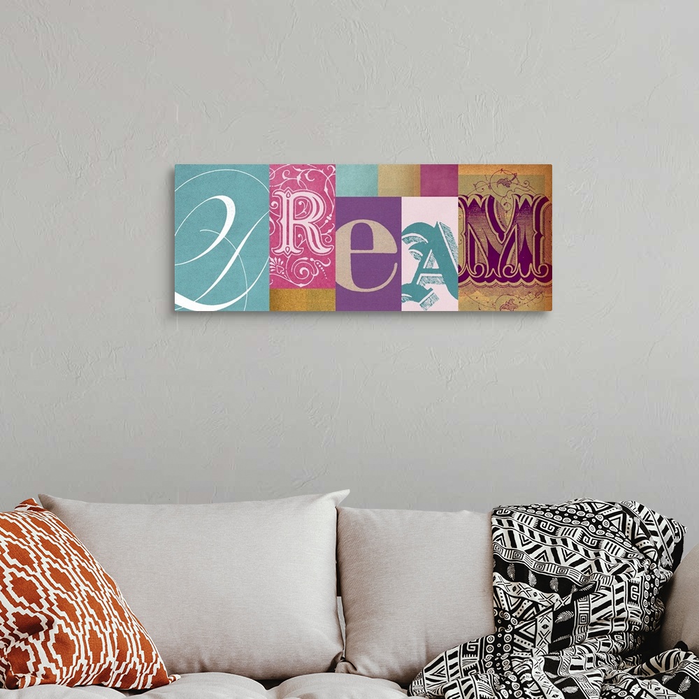 A bohemian room featuring Horizontal artwork on a big wall hanging of the word "DREAM", pieced together with each letter in...