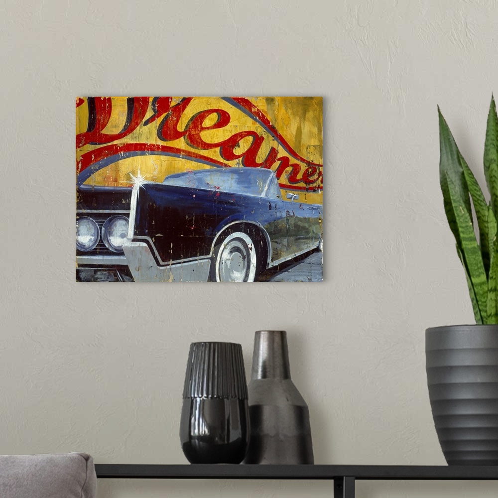 A modern room featuring Large landscape artwork of side angle view of a vintage convertible car, shining in the sunlight....