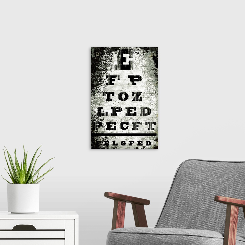 A modern room featuring This is an artistic and distressed recreation of a doctoros eyechart as a vertical poster.