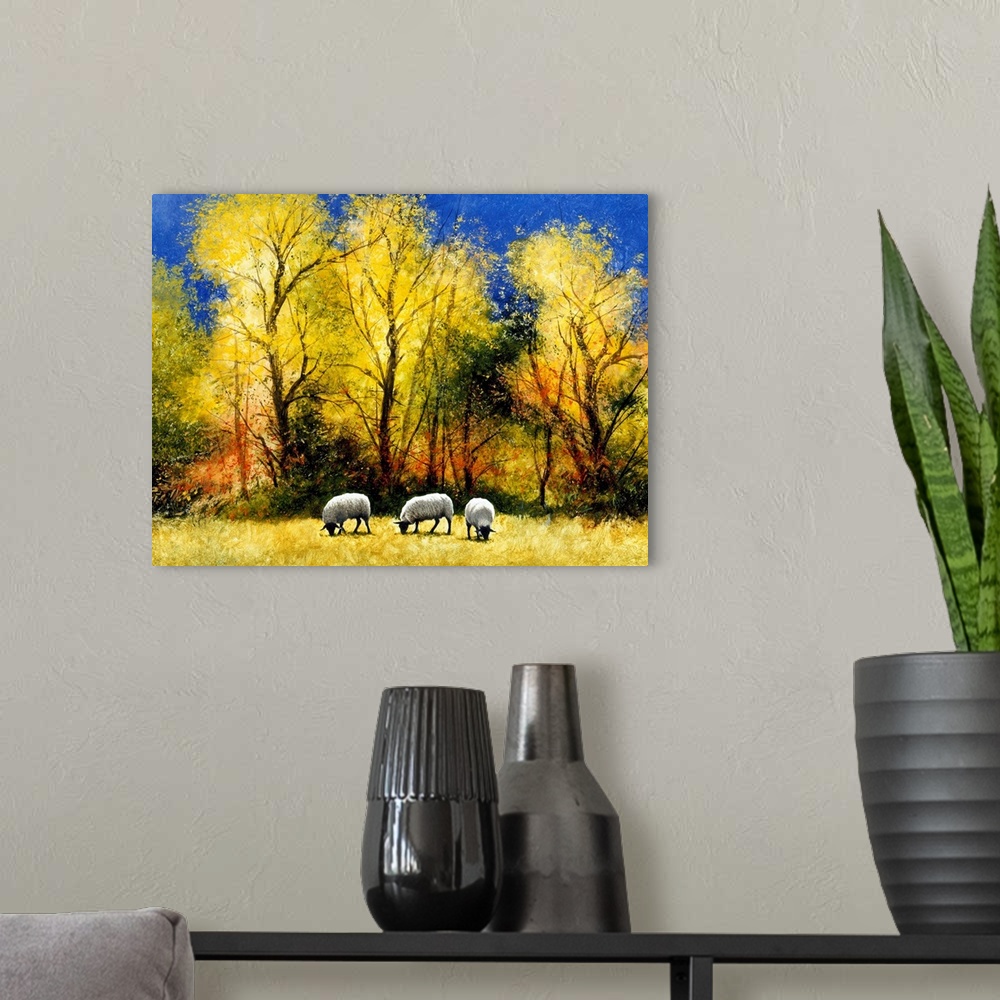 A modern room featuring Contemporary painting of three sheep grazing in an Autumn field.