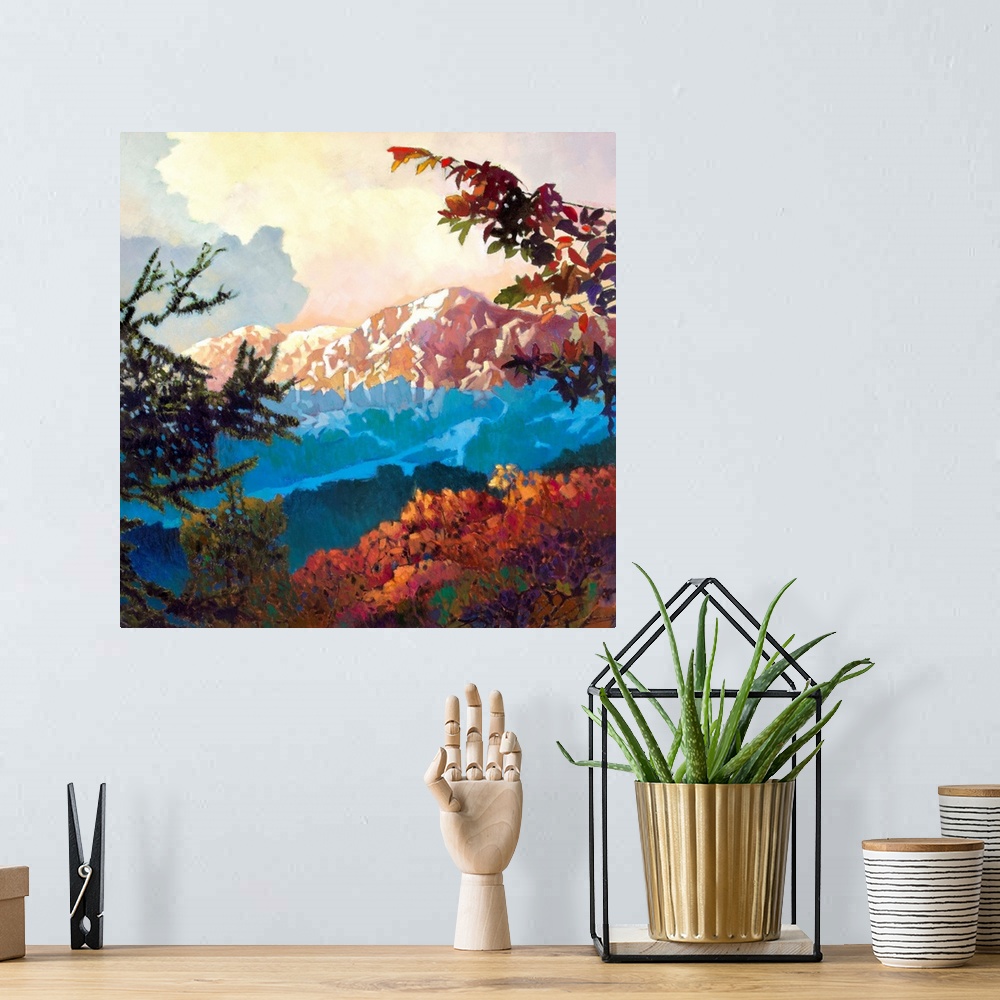 A bohemian room featuring Contemporary painting of a mountain range covered in snow, seen from the trees below.
