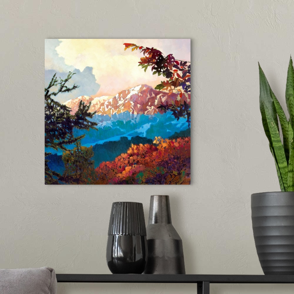 A modern room featuring Contemporary painting of a mountain range covered in snow, seen from the trees below.
