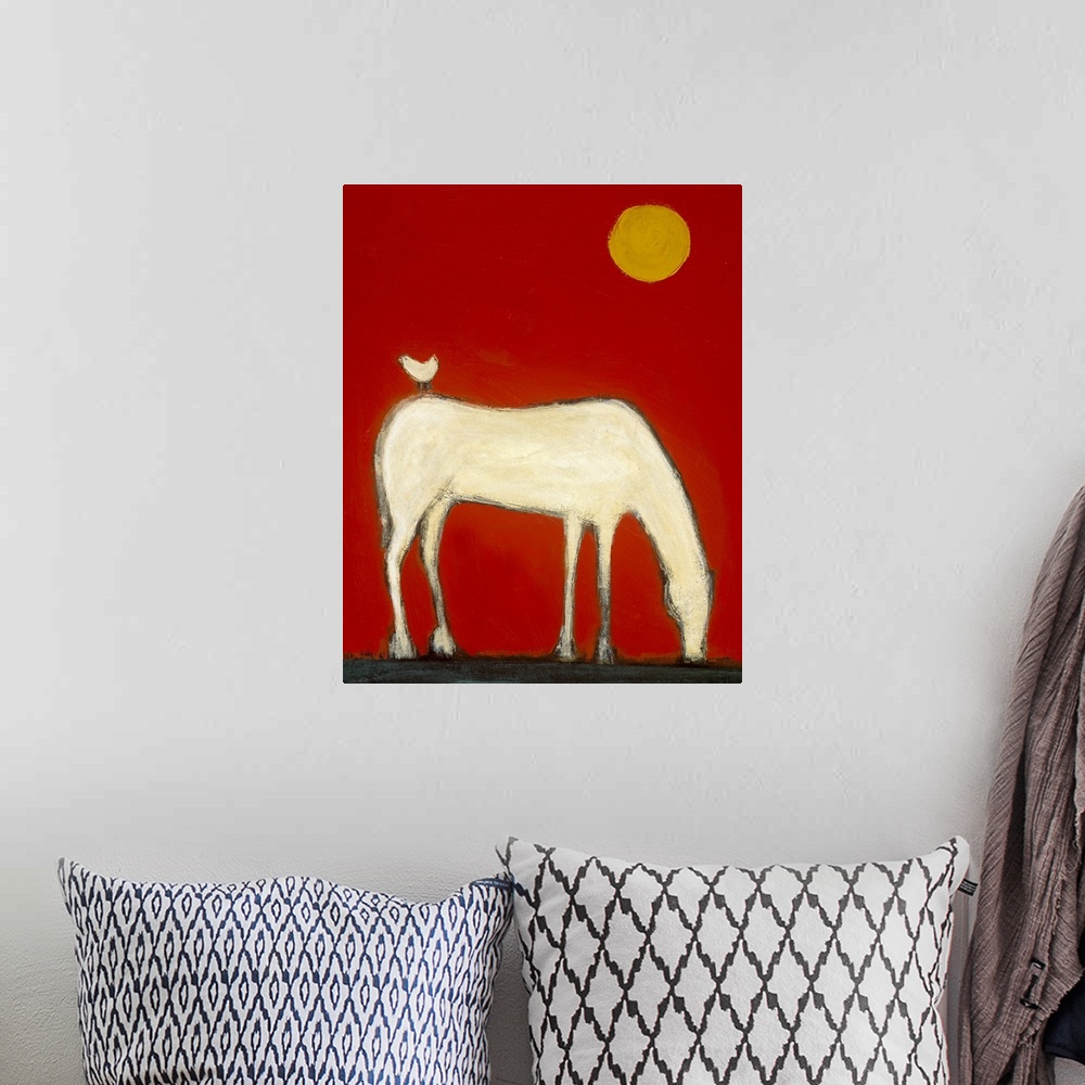 A bohemian room featuring A large vertical contemporary painting of a white horse leaning over to eat with a small white bi...