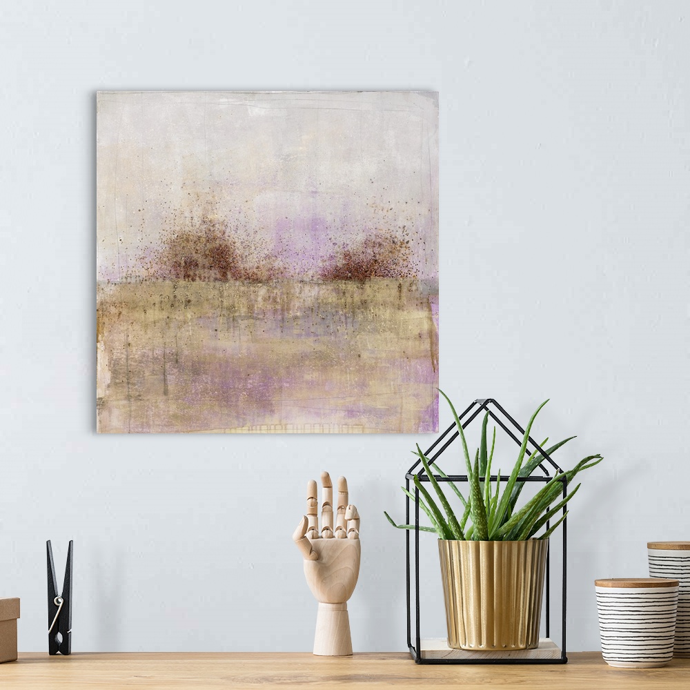 A bohemian room featuring Square abstract painting with brown and black paint splatter across the horizon line and a grey, ...