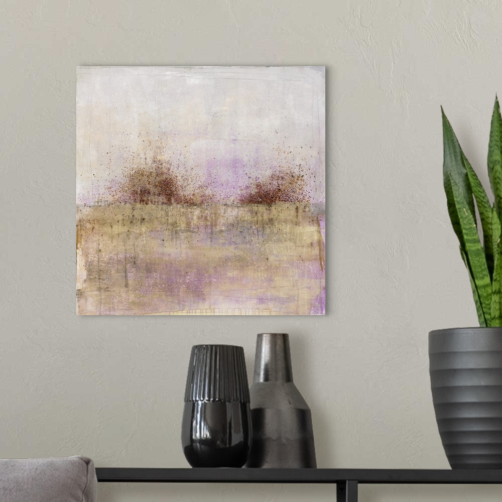 A modern room featuring Square abstract painting with brown and black paint splatter across the horizon line and a grey, ...