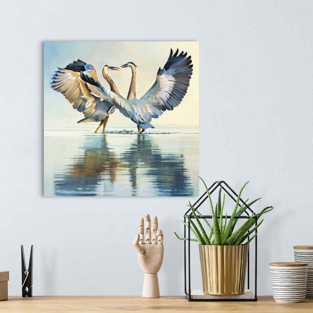 A bohemian room featuring Contemporary painting of two herons with their wings outstretched and reflections in the water.