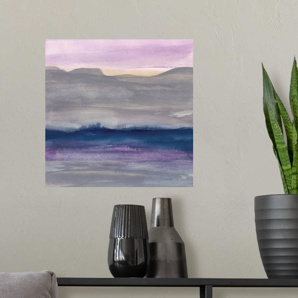 A modern room featuring Watercolor landscape painting with grey hills and a lavender sky.