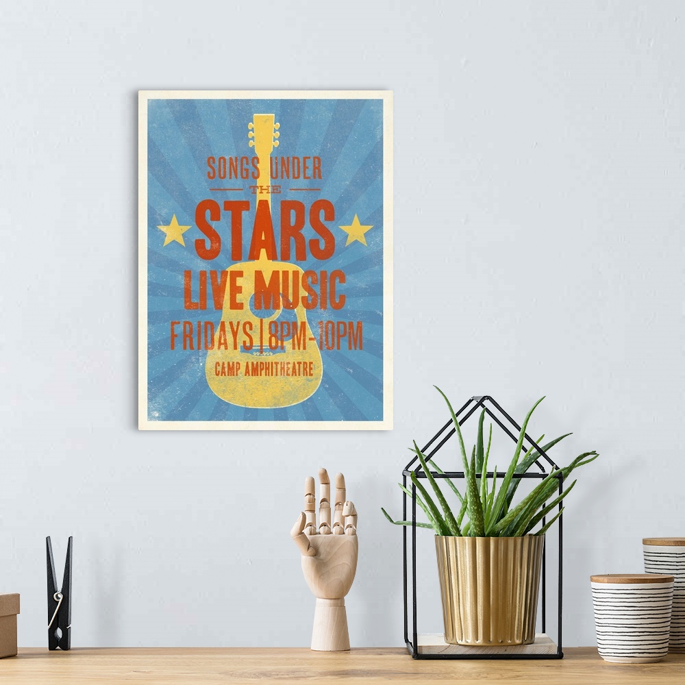 A bohemian room featuring Retro mid-century stylized concert poster artwork.