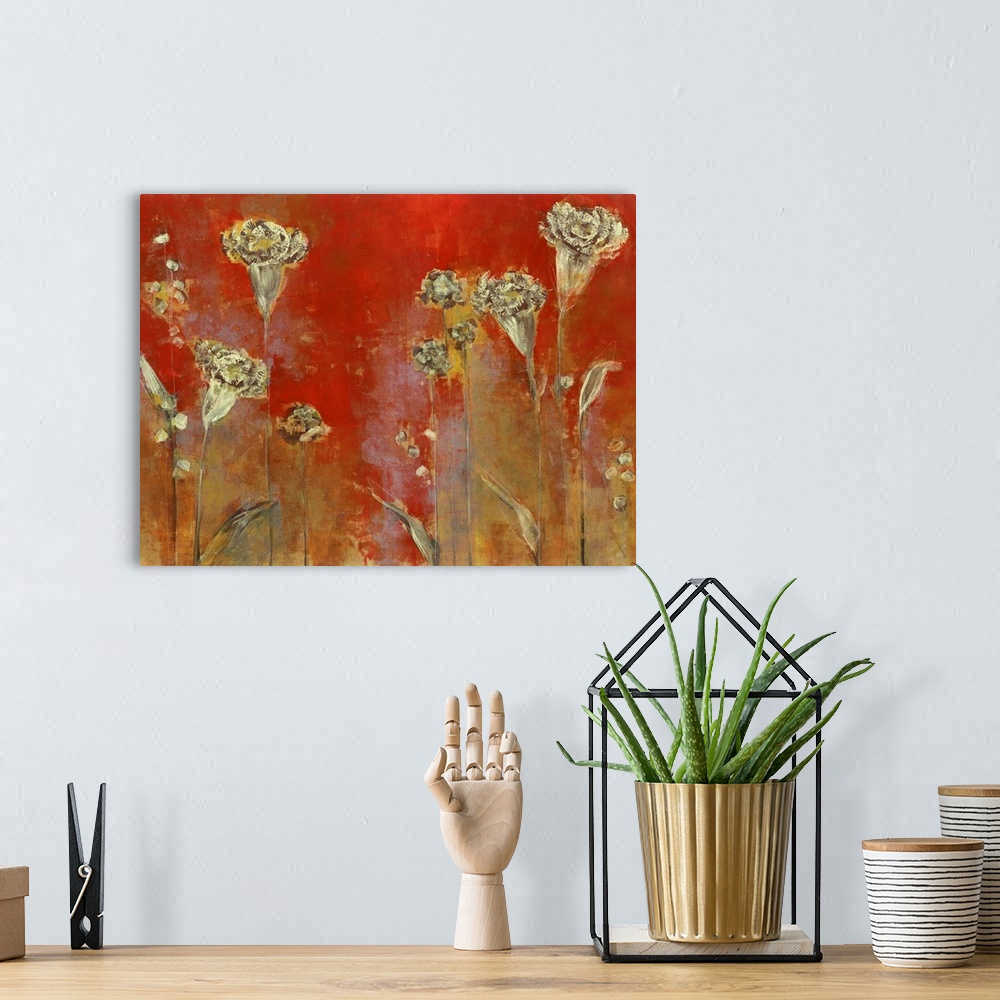 A bohemian room featuring Contemporary painting of bronzed flowers against a red background.