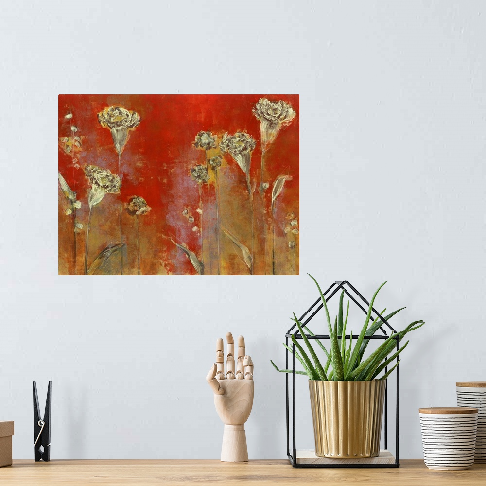A bohemian room featuring Contemporary painting of bronzed flowers against a red background.