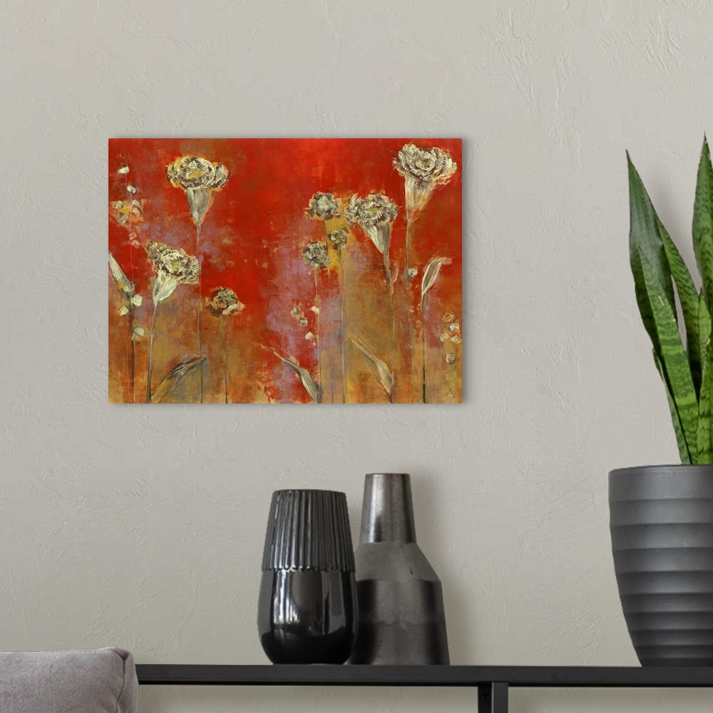 A modern room featuring Contemporary painting of bronzed flowers against a red background.