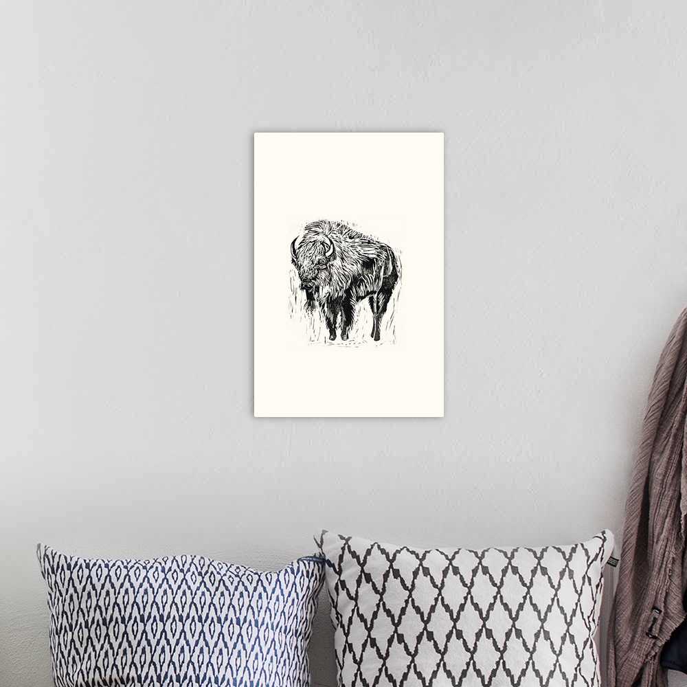 A bohemian room featuring Black and white block print illustration of a bison on an off white background.