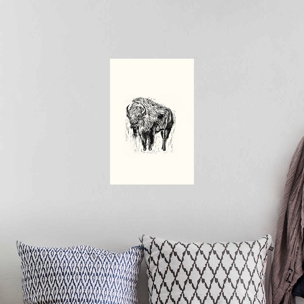 A bohemian room featuring Black and white block print illustration of a bison on an off white background.