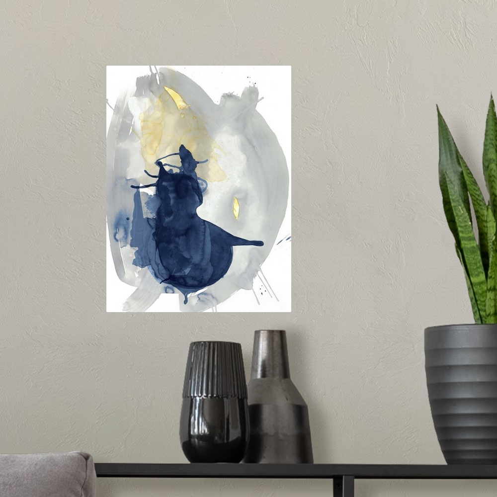 A modern room featuring Large abstract watercolor painting in grey, blue, and yellow hues on a white background.