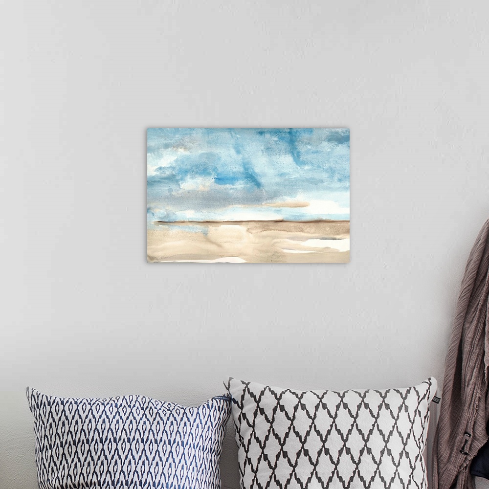 A bohemian room featuring Contemporary landscape watercolor painting with a blue sky and beige ground.
