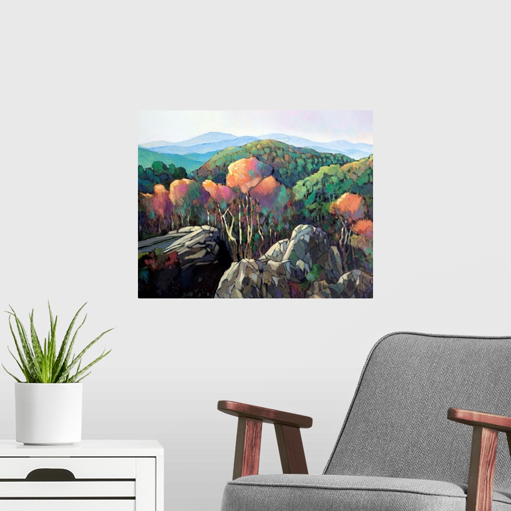 A modern room featuring A contemporary painting of a view looking over a forested mountain valley.