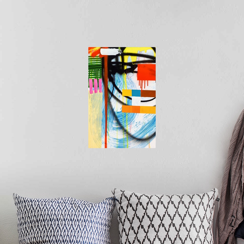 A bohemian room featuring Abstract geometric design in bright primary colors.