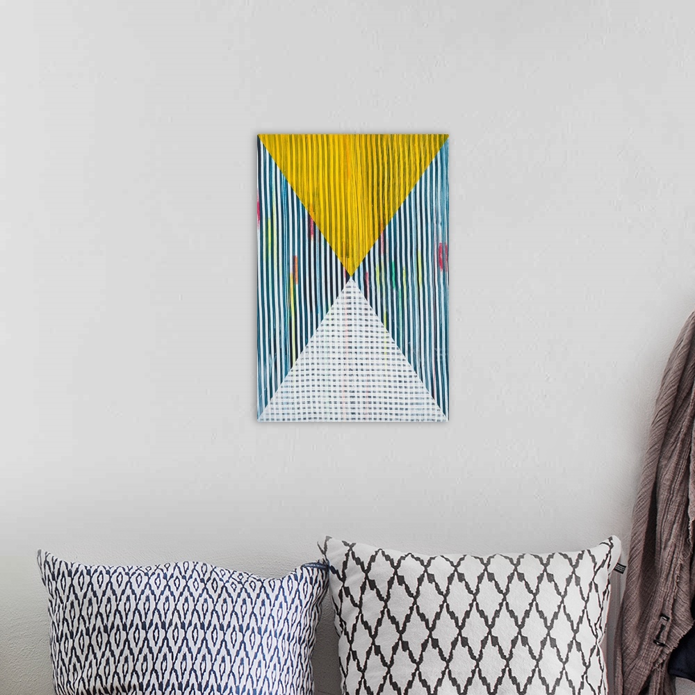 A bohemian room featuring Abstract geometric pattern in bright primary colors.