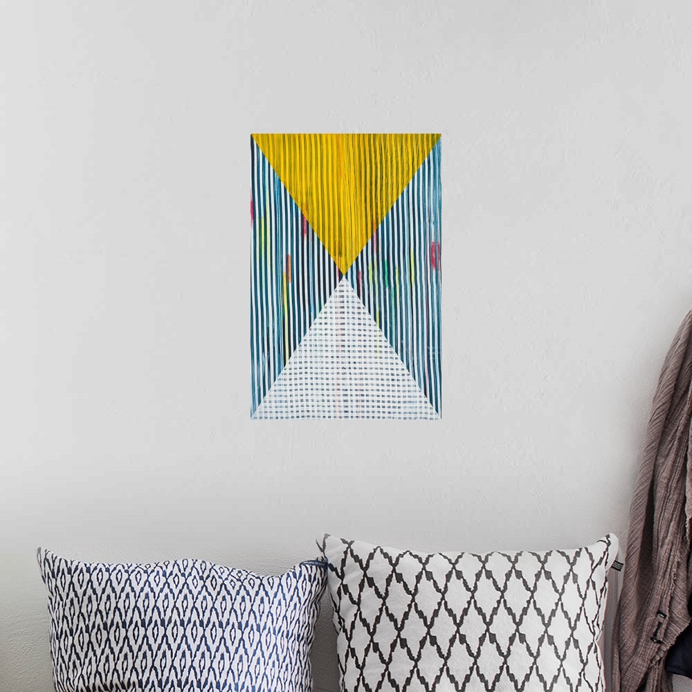 A bohemian room featuring Abstract geometric pattern in bright primary colors.