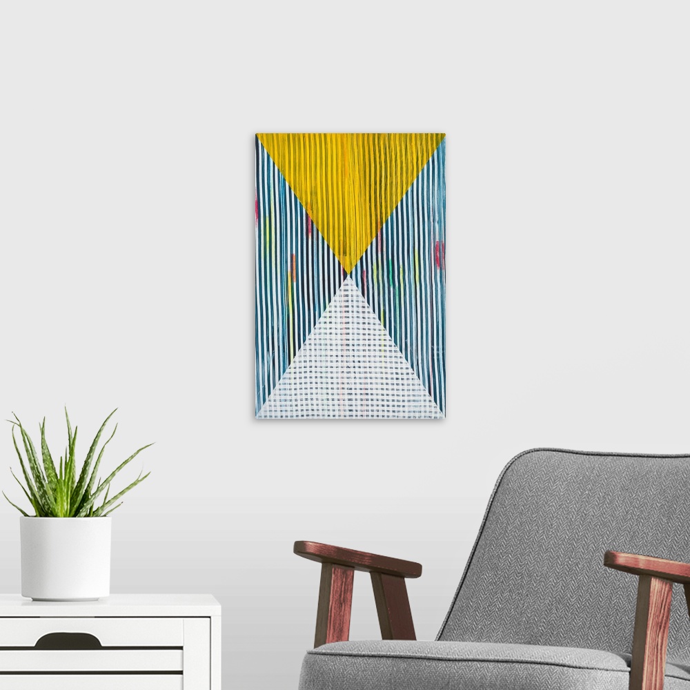 A modern room featuring Abstract geometric pattern in bright primary colors.