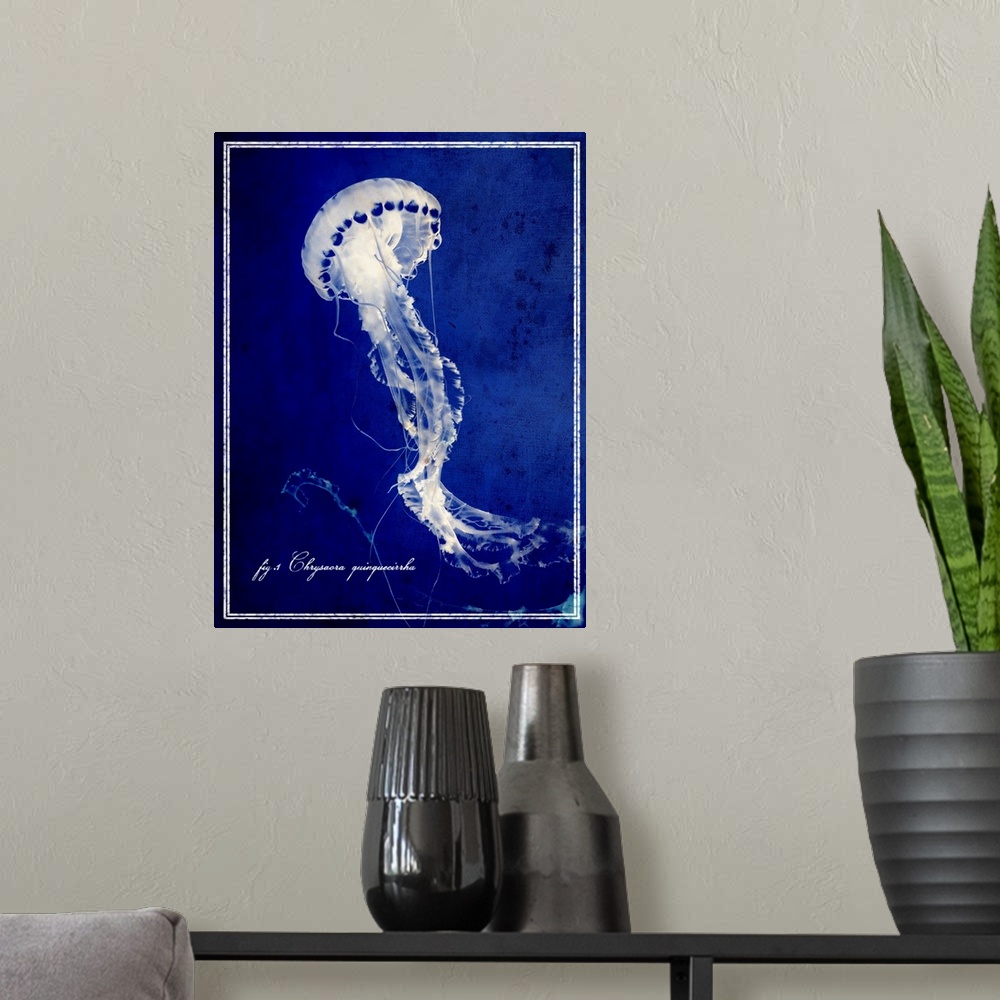 A modern room featuring Big vertical wall hanging of a jellyfish on a deep blue background, with script text in the lower...