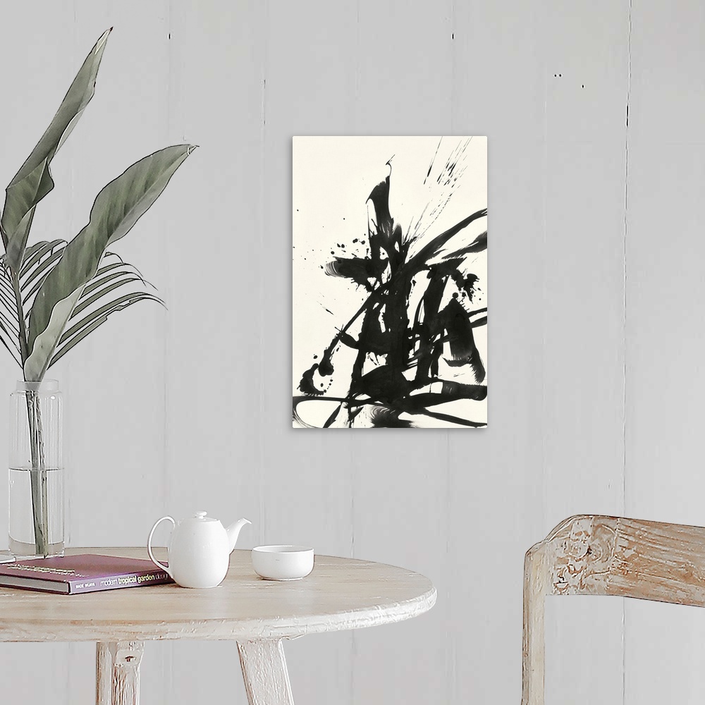 A farmhouse room featuring Abstract artwork in black paint on cream.