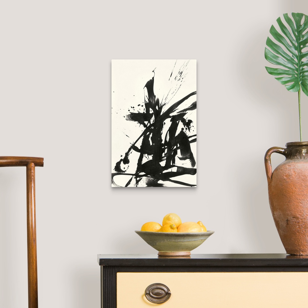 A traditional room featuring Abstract artwork in black paint on cream.