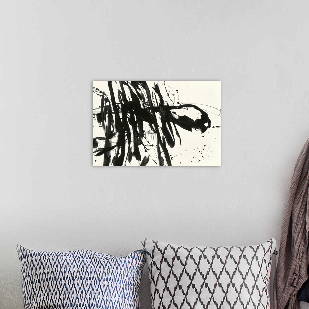 A bohemian room featuring A contemporary abstract painting using bold black lines against a cream background.