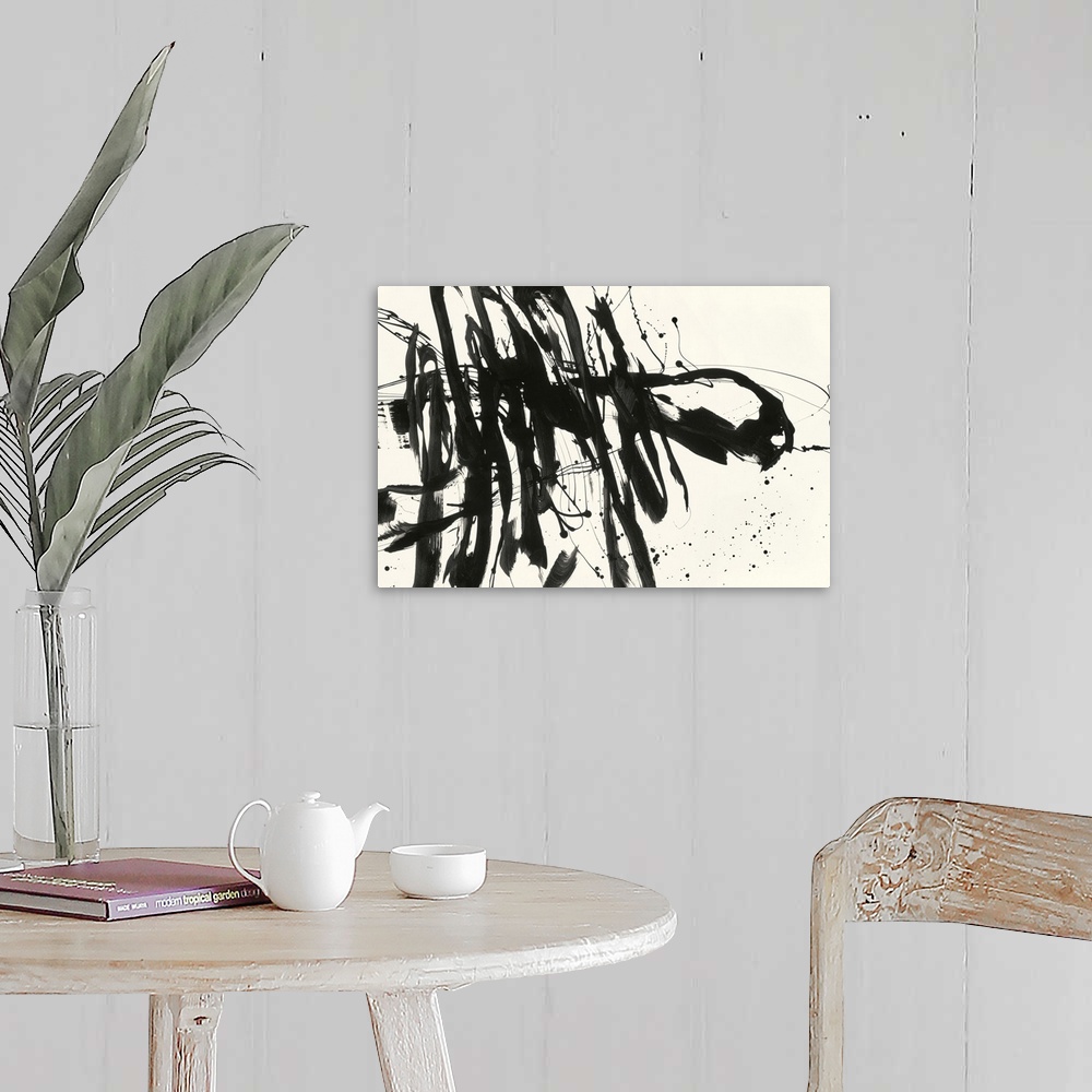 A farmhouse room featuring A contemporary abstract painting using bold black lines against a cream background.