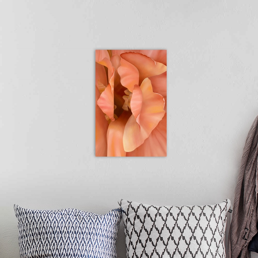 A bohemian room featuring Vertical close up floral painting of layers of petals in a light yellow and orange.