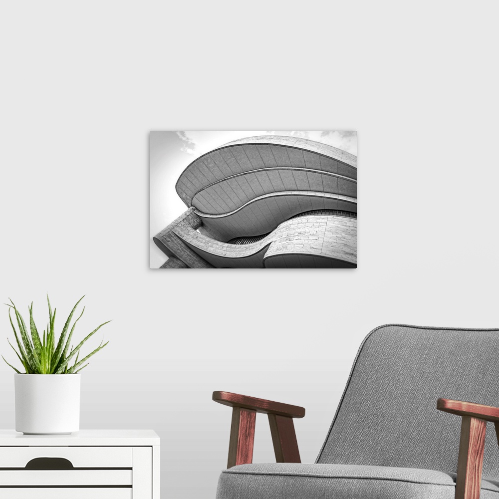 A modern room featuring A fine art photograph of architectural attributes of a museum.