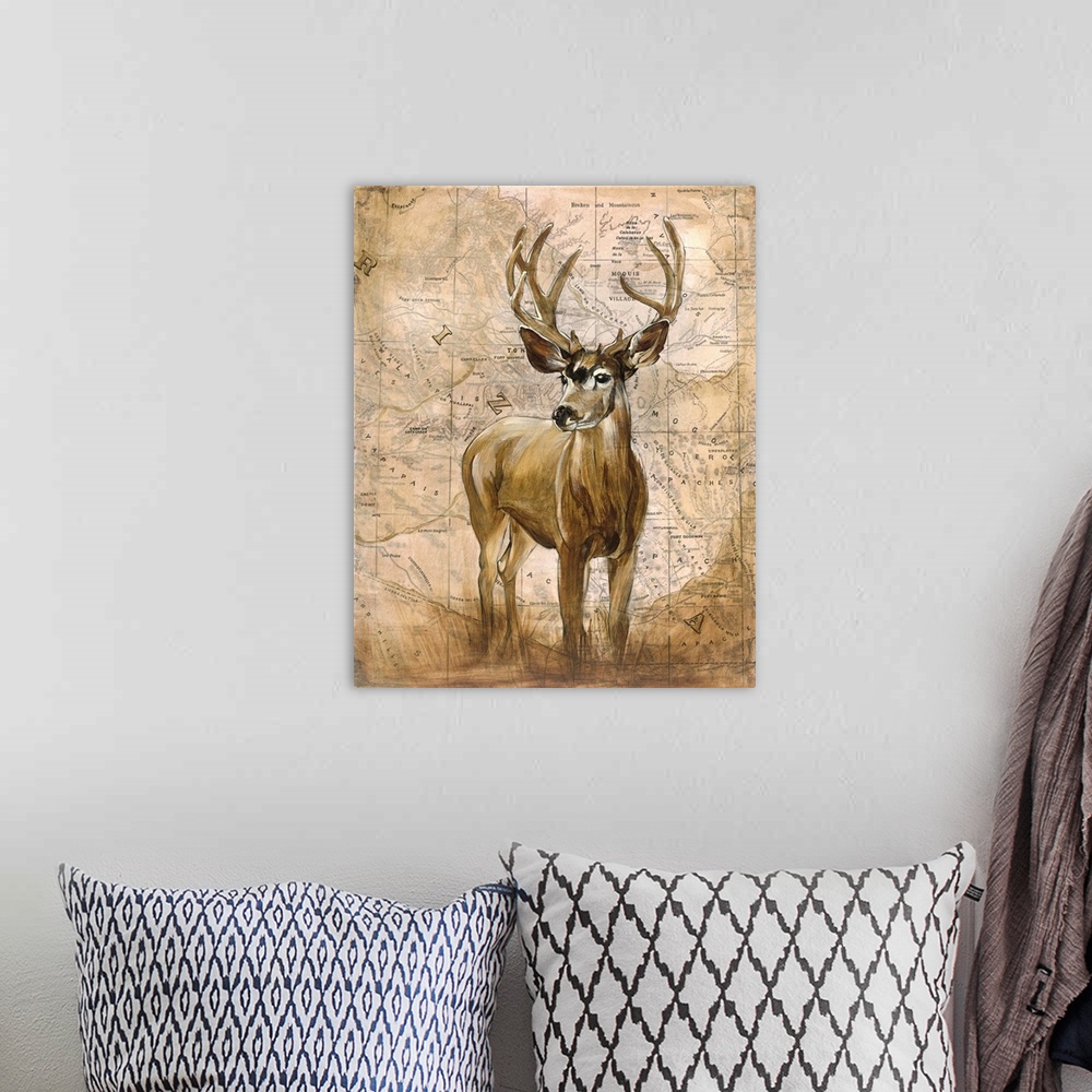 A bohemian room featuring Art piece of a big buck standing in front of a vintage looking map of Arizona.