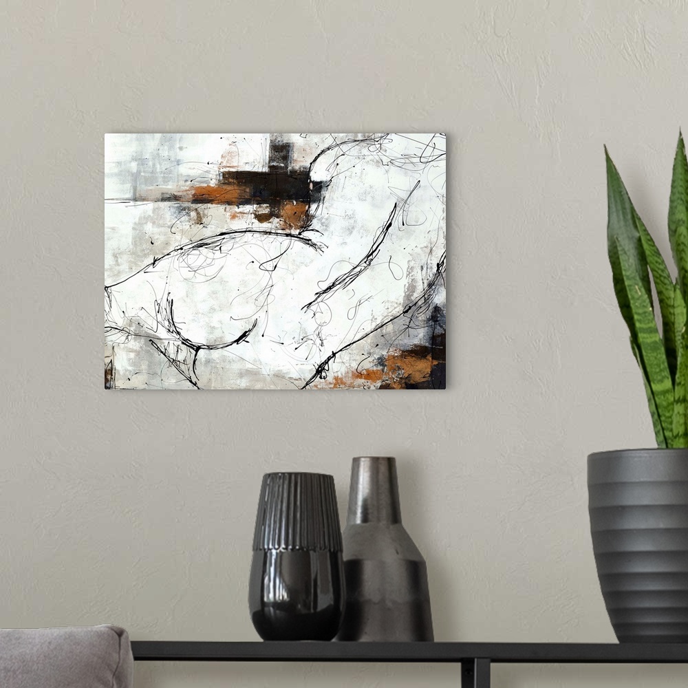 A modern room featuring Contemporary nude sketch in black and white with designed pops of copper and silver on the top an...