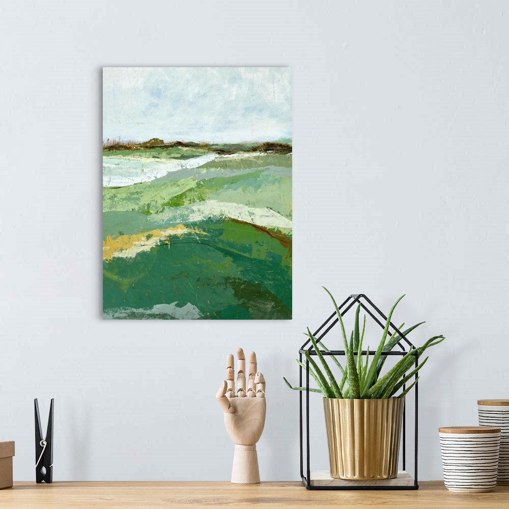 A bohemian room featuring Contemporary landscape painting of a green field under a gray sky.